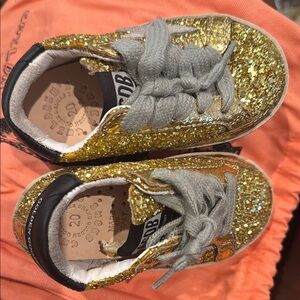 Golden Goose Gold and Black Glitter Sneakers